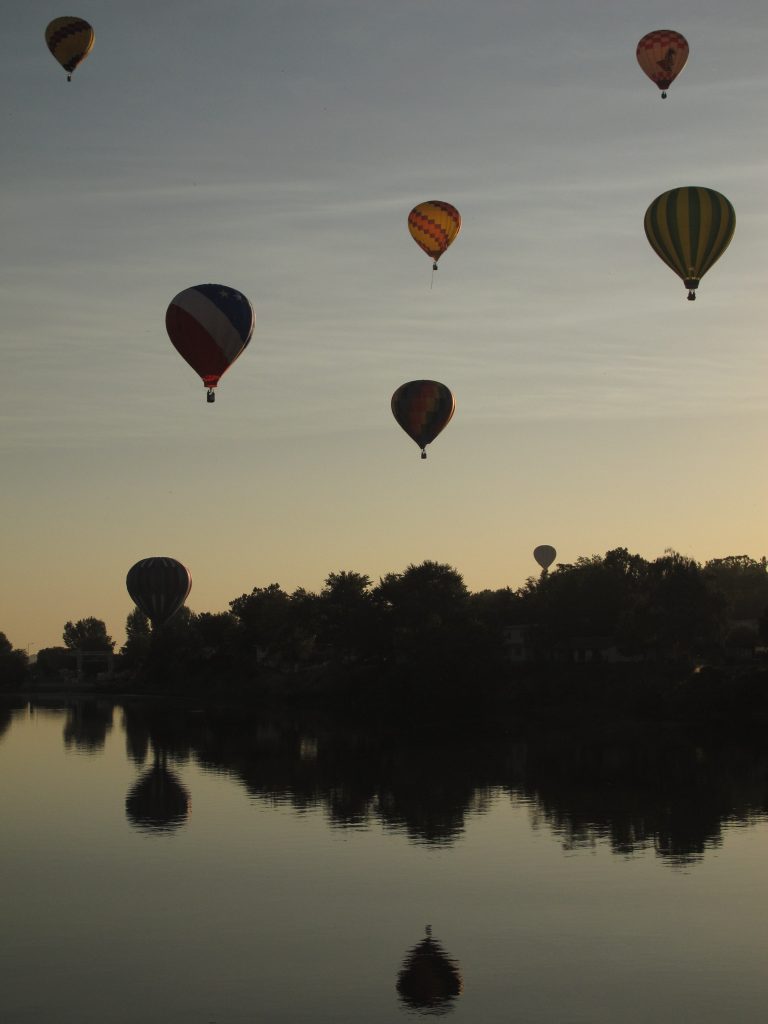 Balloons reflected on the Yakama River