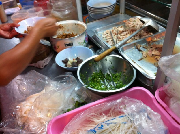 Making Tom Yum Noodle Soup